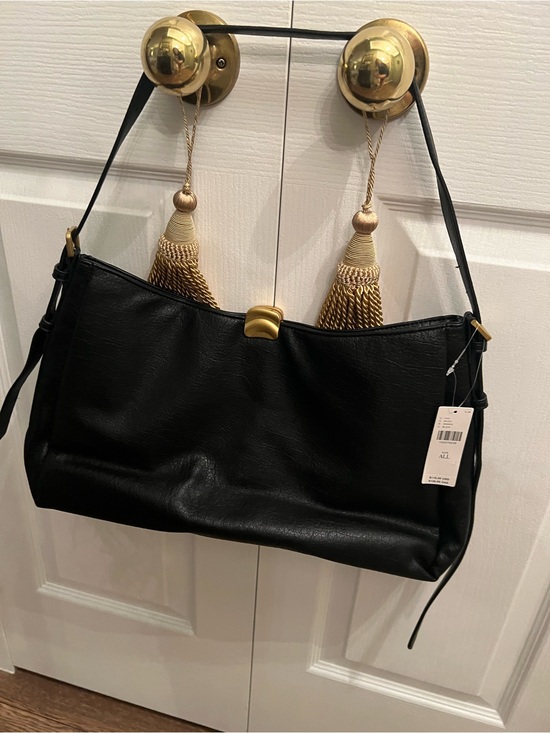 Anthropologie Handbags - Anthropologie Black Shoulder Bag with Gold Accent